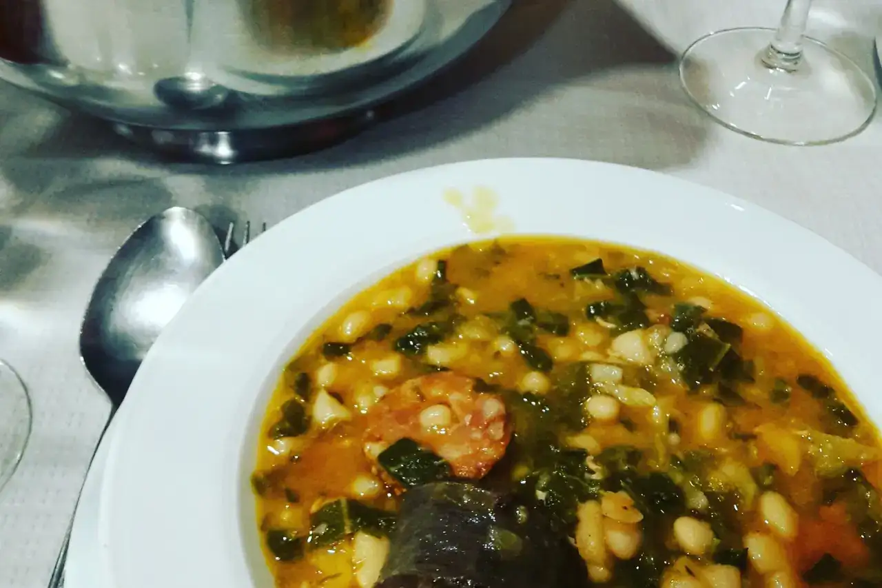 Mountain Stew, a traditional Cantabrian dish (Spain). It's prepared with white haricot beans, collard greens and products from the pig slaug